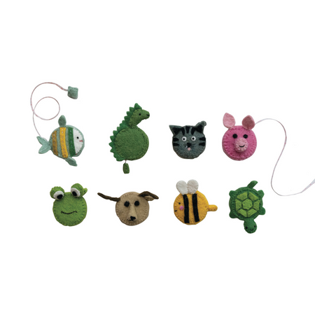 Set of colorful animal-shaped measuring tapes on white background