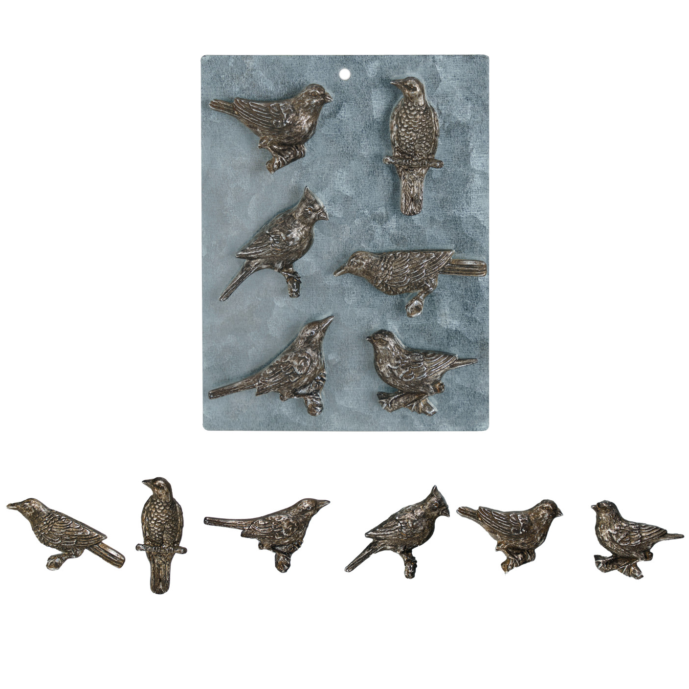 Bronze bird figurines on a textured blue background