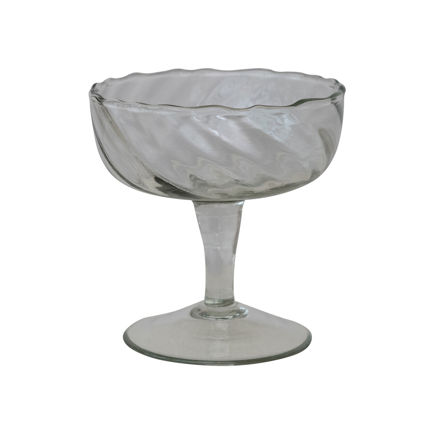 Clear glass footed coupe glass on a white background