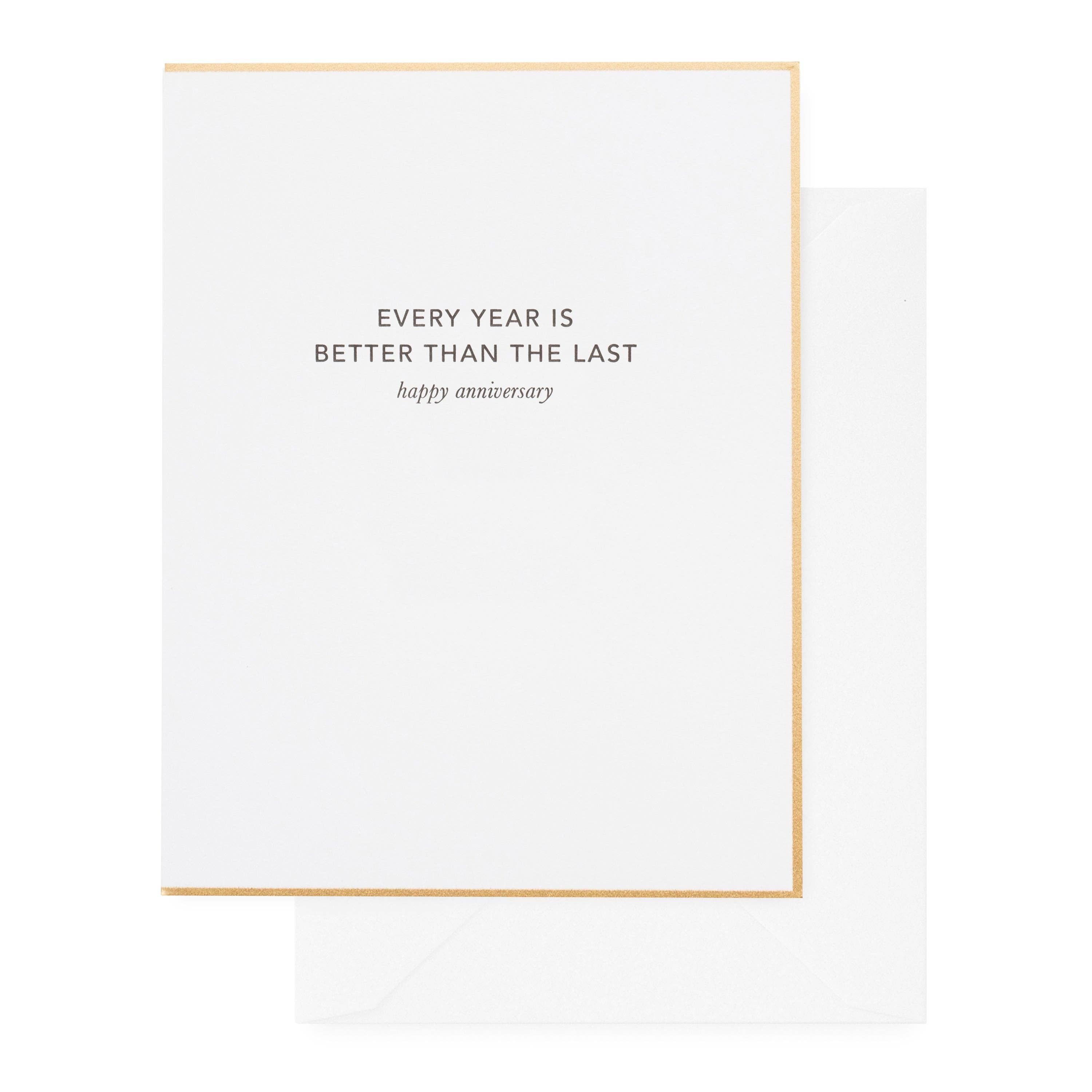 White card with gold border and text 'Every year is better than the last happy anniversary' on a white background