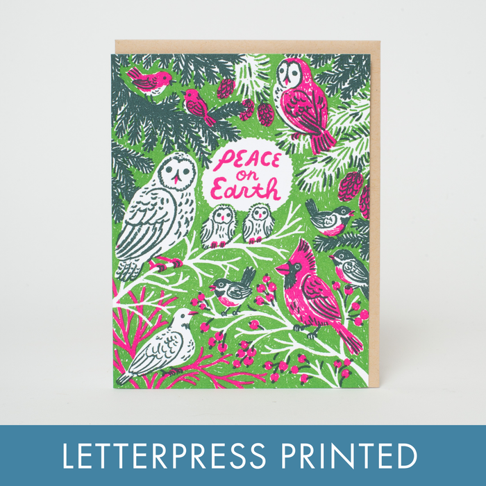 Greeting card with bird illustrations and 'Peace on Earth' text on a green background