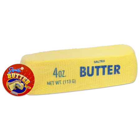Block of butter squishy with a label on a white background