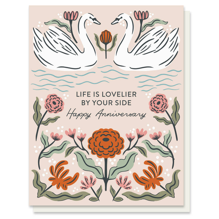 Card with swans and floral design on a beige background