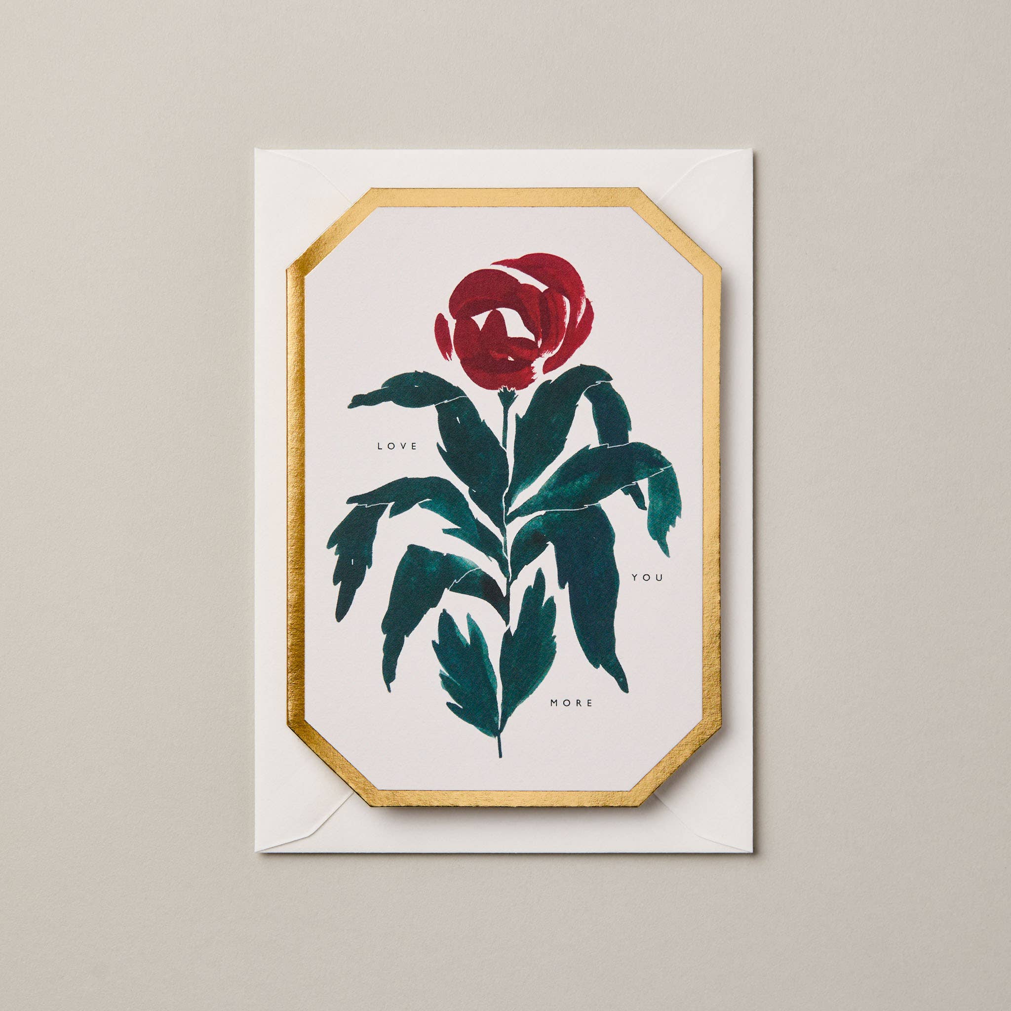 Greeting card with a red rose design and text on a beige background