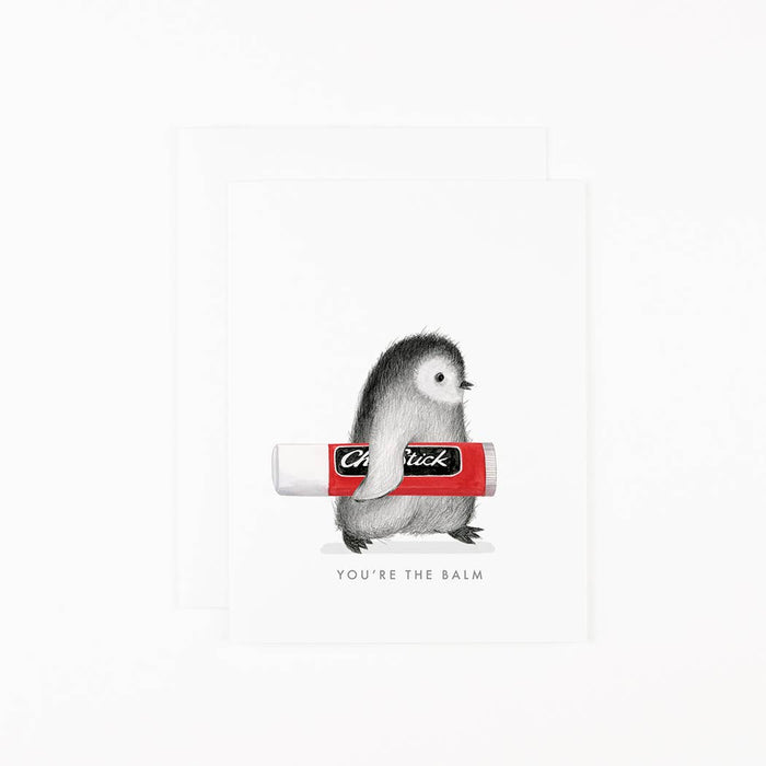 card with Illustration of a penguin holding a tube of Chapstick on a white background that reads "you're the balm"