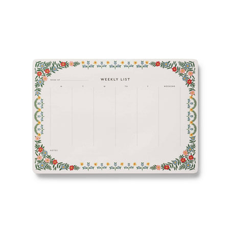 Weekly planner pad with floral border on a white background