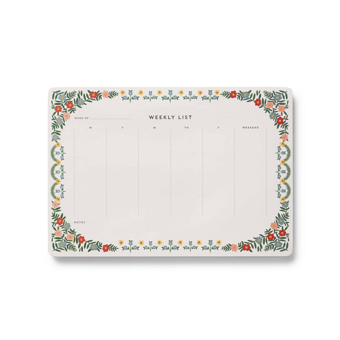 Weekly planner pad with floral border on a white background