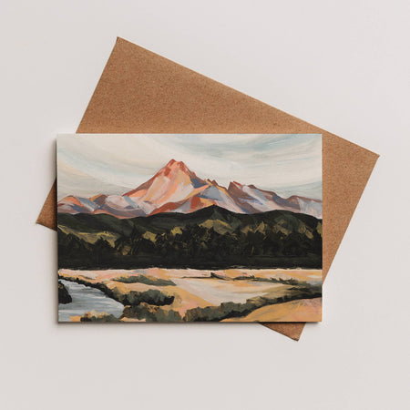 Greeting card with mountain landscape design on a brown envelope
