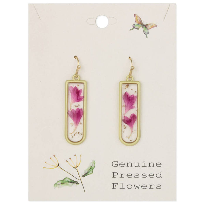 Gold earrings with pink flowers on a card labeled 'Genuine Pressed Flowers'.