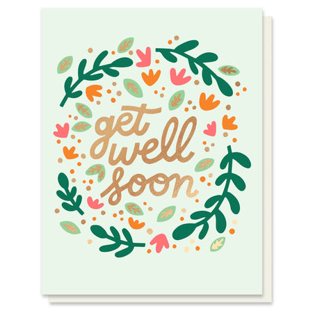 Greeting card with 'get well soon' text surrounded by decorative leaves and flowers on a light green background.