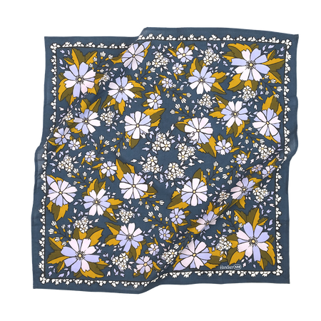 Floral patterned fabric square on a white background