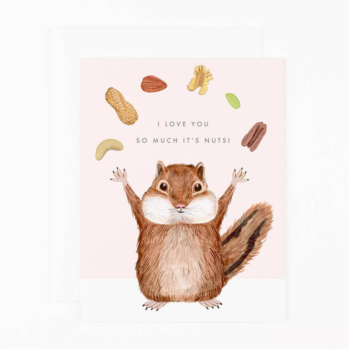 Card with squirrel illustration throwing nuts that reads "I love you so much it's nuts!" on white background