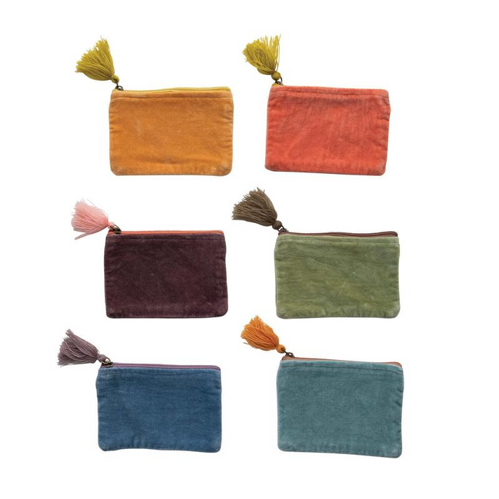 Set of six colorful fabric pouches with tassels on a white background