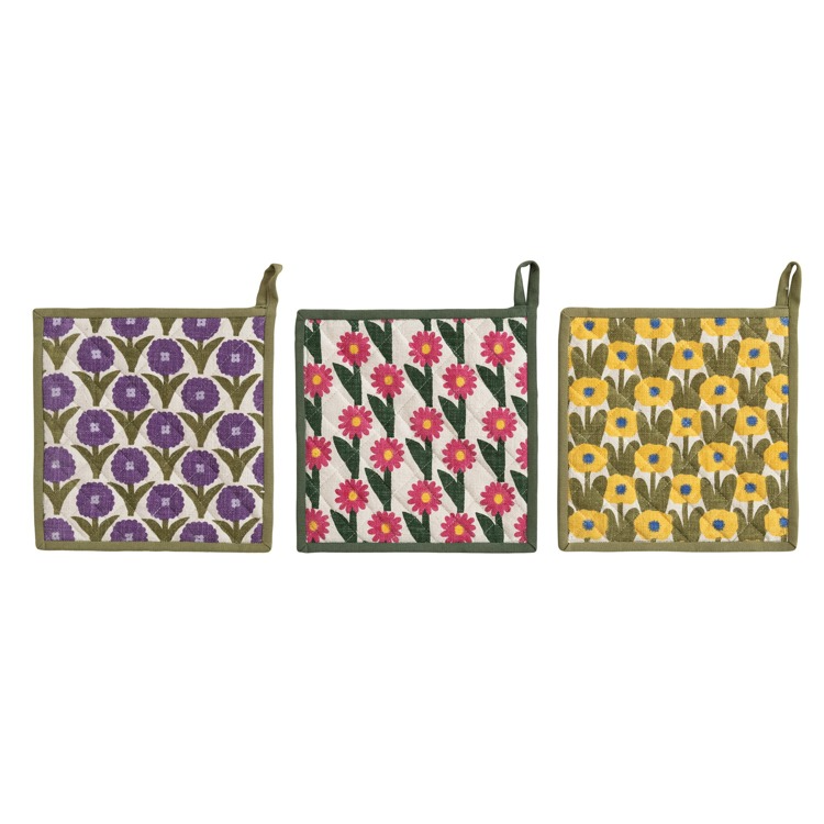 Three floral patterned pot holders on a white background
