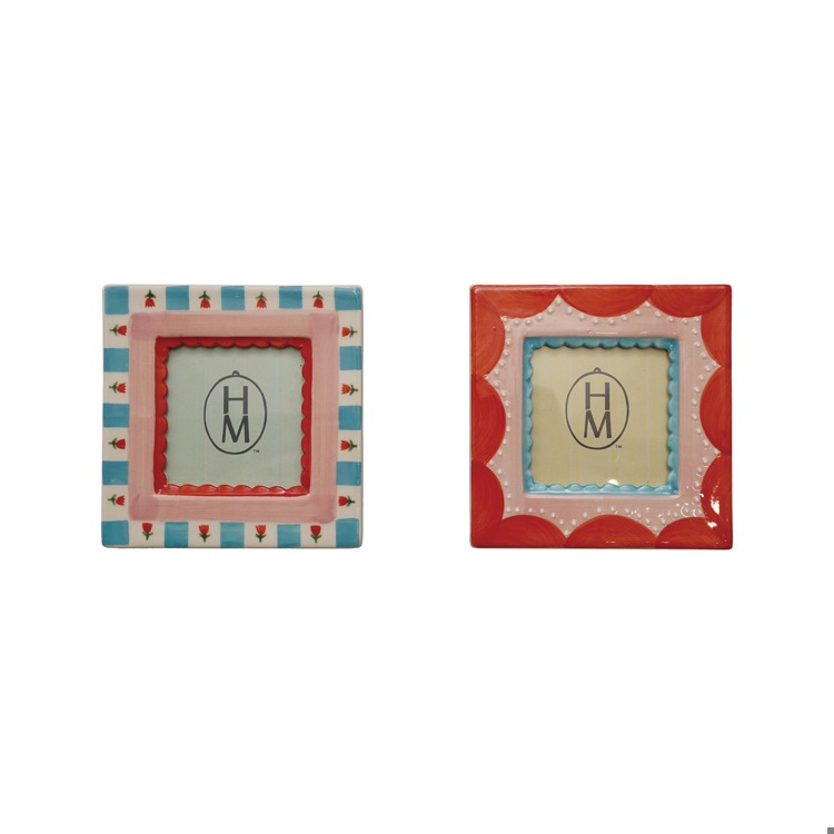 Two decorative picture frames with 'HM' logo on a white background