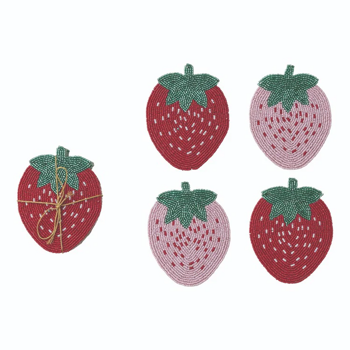 Set of four strawberry-shaped coasters with green leaves on a white background