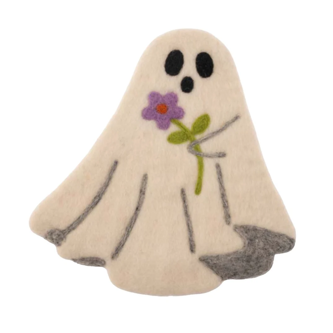 Handcrafted felt trivet in the shape of a ghost holding a purple flower, on a white background.