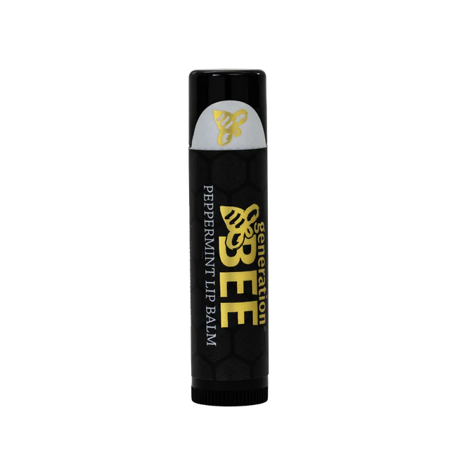 Black lip balm container with yellow text on a white background
