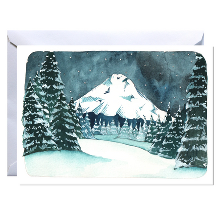 Greeting card with a snowy mountain and trees design on a white background
