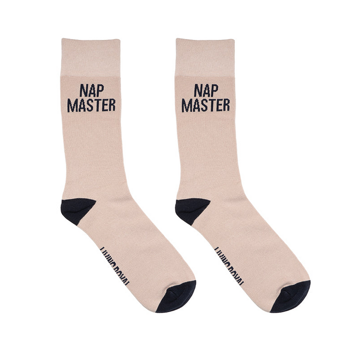 Beige socks with 'Nap Master' text on a white background