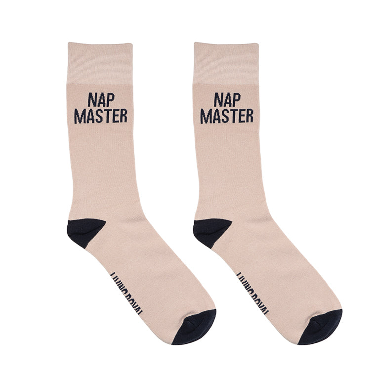 Beige socks with 'Nap Master' text on a white background