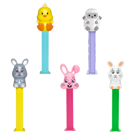 Set of colorful pez dispensers with animal figures on a white background