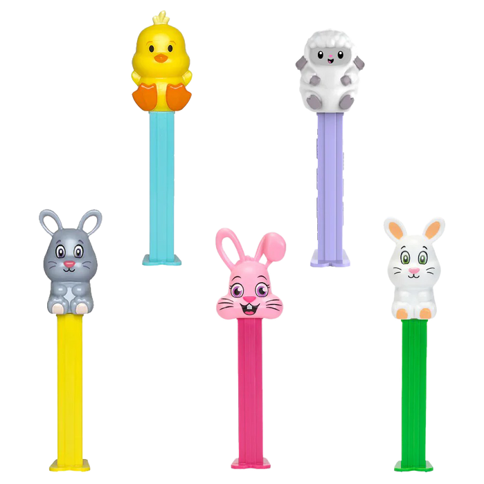 Set of colorful pez dispensers with animal figures on a white background