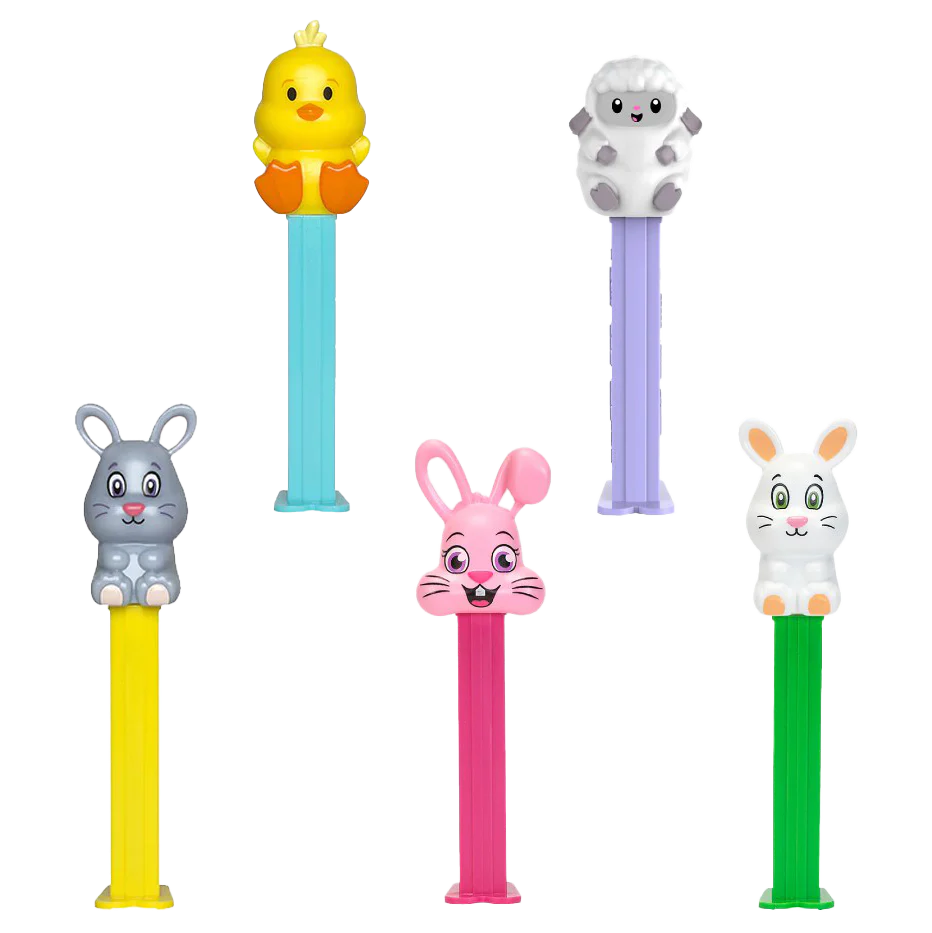 Set of colorful pez dispensers with animal figures on a white background