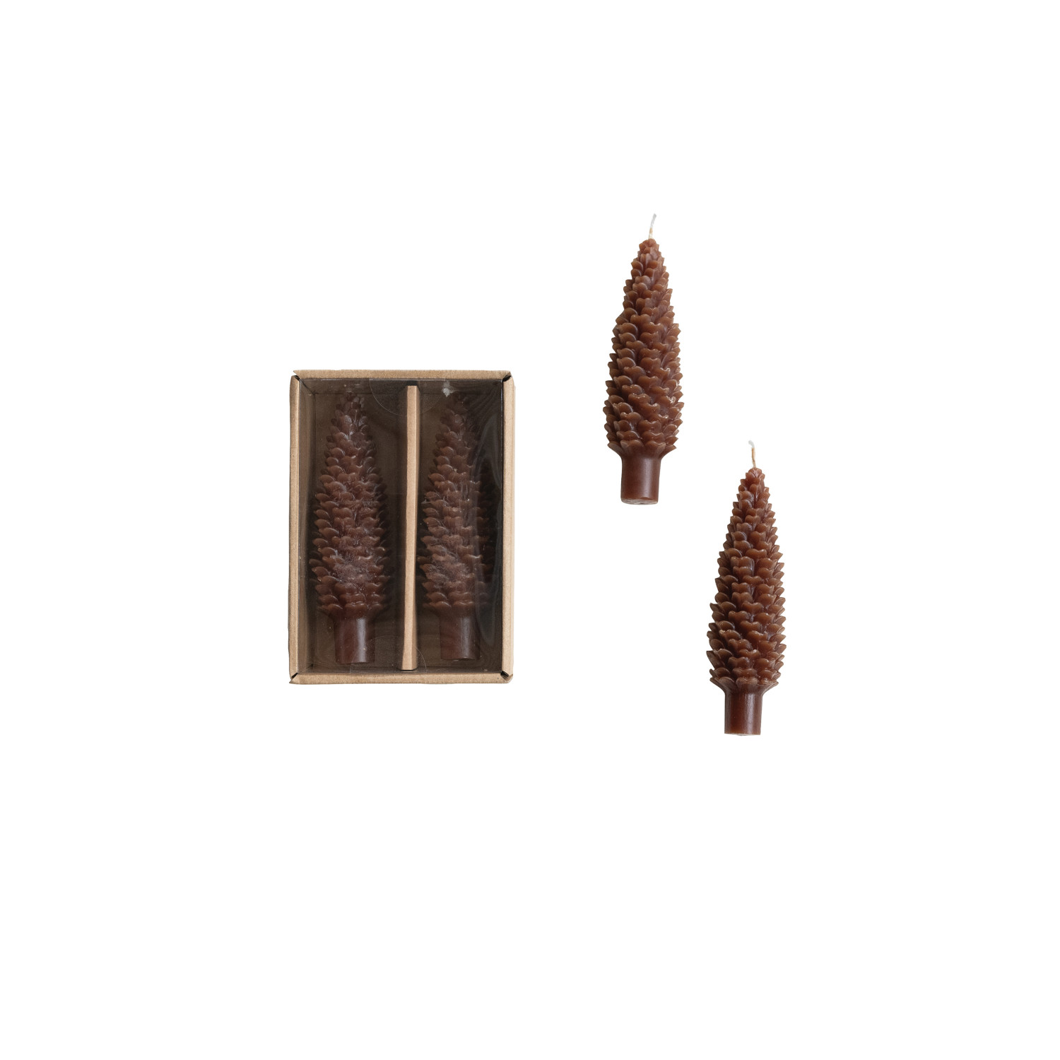 set of two pinecone shaped candles in cardboard box on white background
