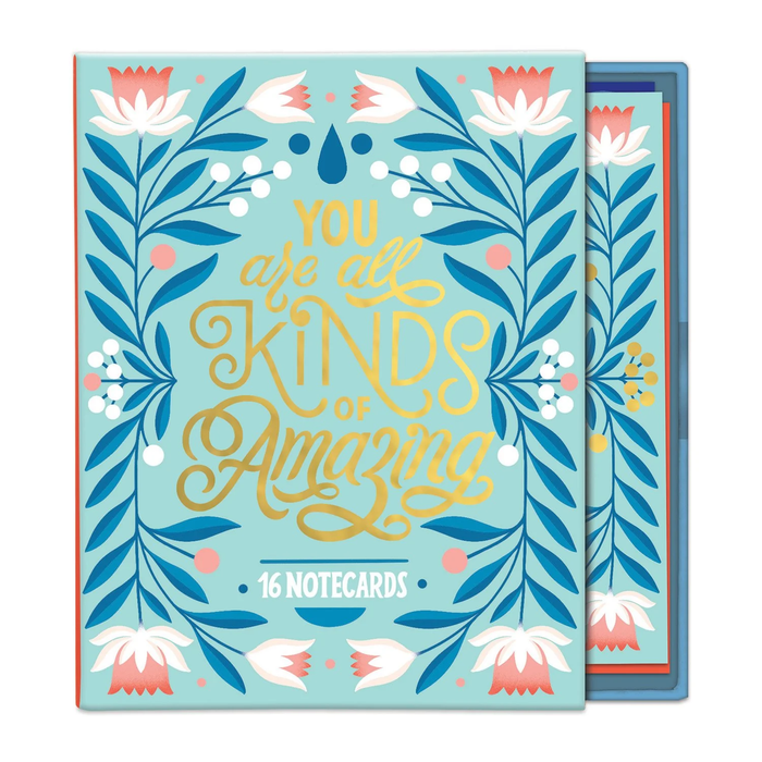 Notecard set with floral design and text 'You are all kinds of amazing' on a light blue background.