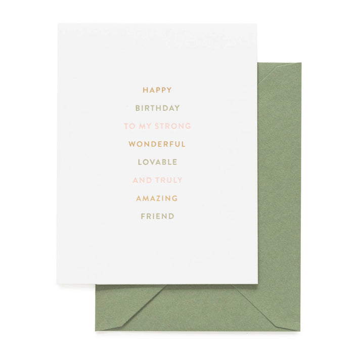 white birthday card that reads "happy birthday to my strong, wonderful, lovable, and truly amazing friend" with a green envelope