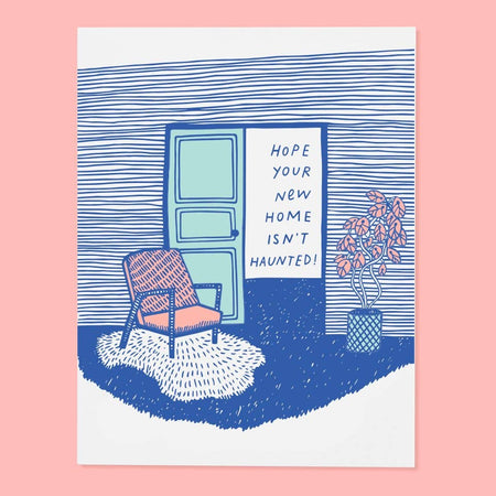 A greeting card with an illustration of a chair and a potted plant in a room with a humorous message 'Hope your new home isn't haunted!'.