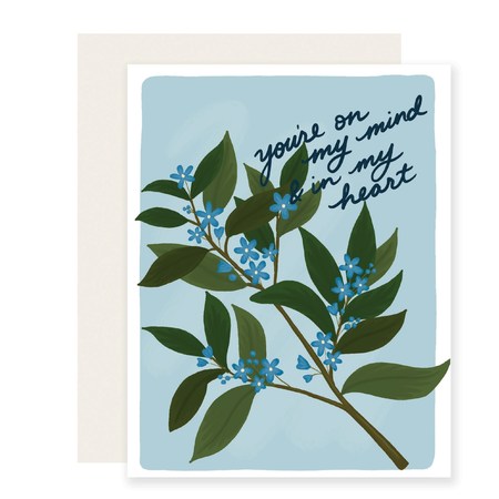 card with blue flowers that reads "you're on my mind & in my heart"