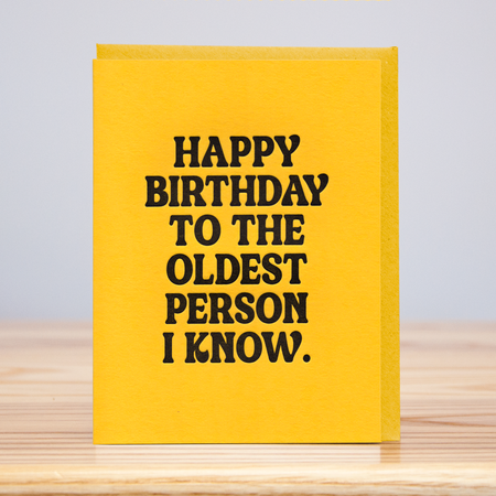 yellow card that is letterpressed with "happy birthday to the oldest person I know." in black font