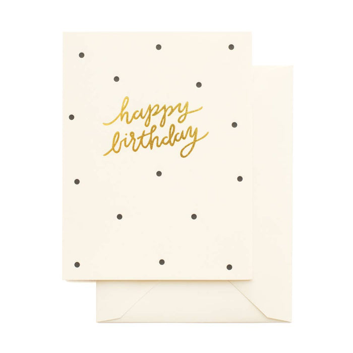 white card with black polka dots that reads " Happy Birthday" with script font in gold foil on white background