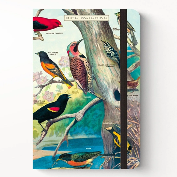 Notebook with bird illustration cover on a white background