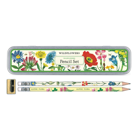 A set of pencils with floral designs, packaged in a tin box with a colorful label featuring various flowers and the text 'Wildflowers Pencil Set'.
