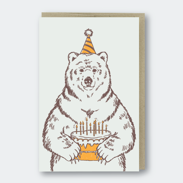 bday card with bear holding a cake