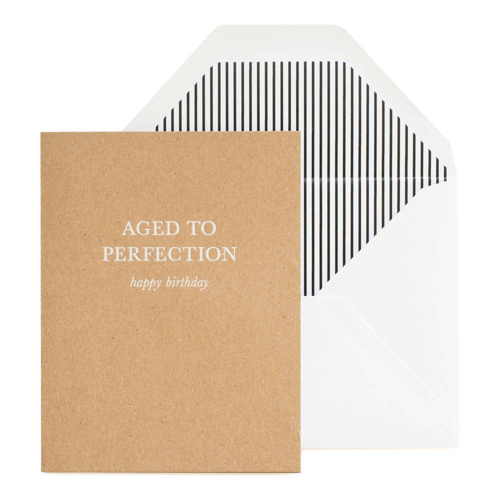 brown craft paper card that reads aged to perfection with white envelope with striped detailing